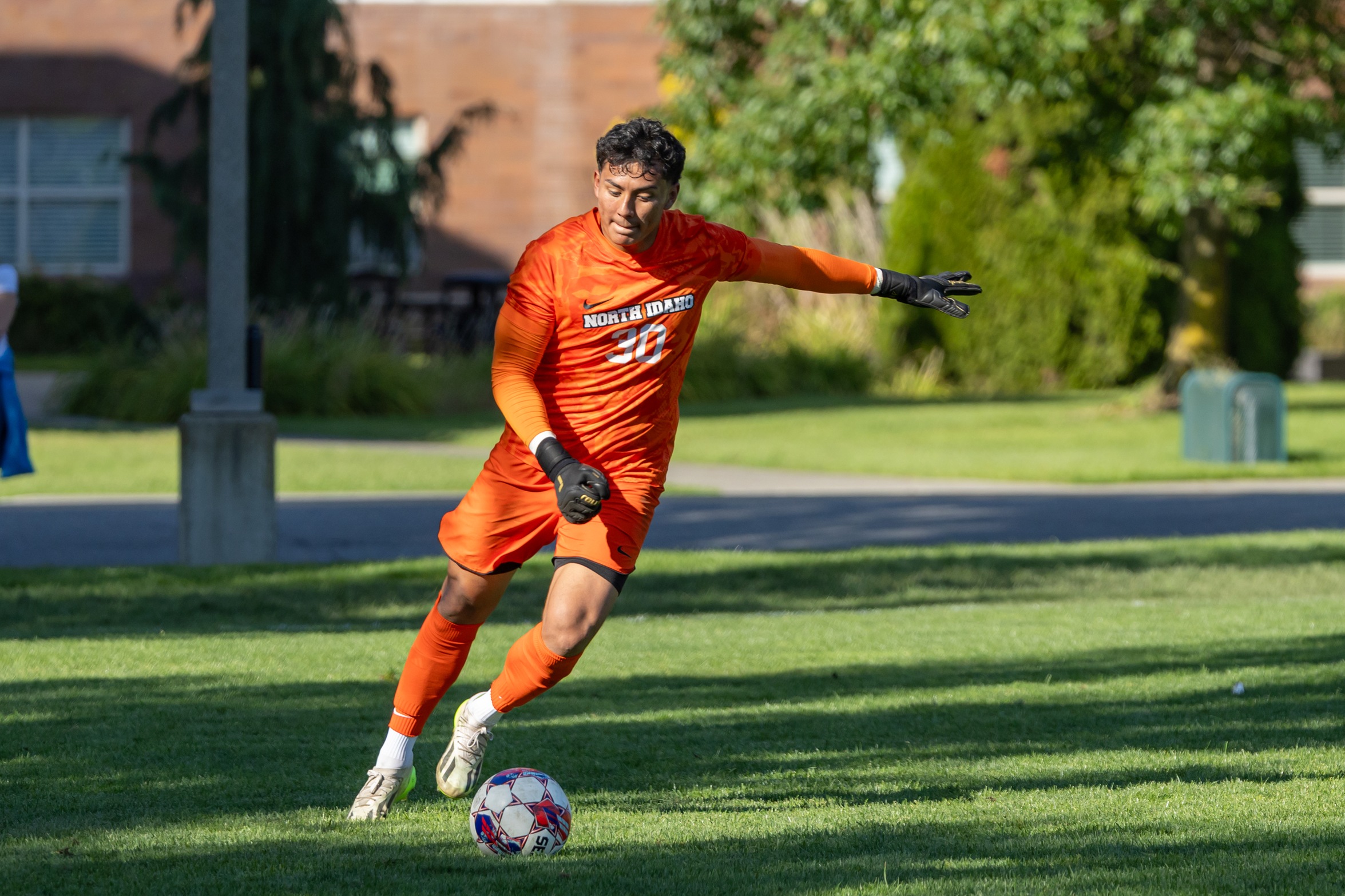 Ariel Martinez, playing as the goalie, kicks the ball down Eisenwinter Field.