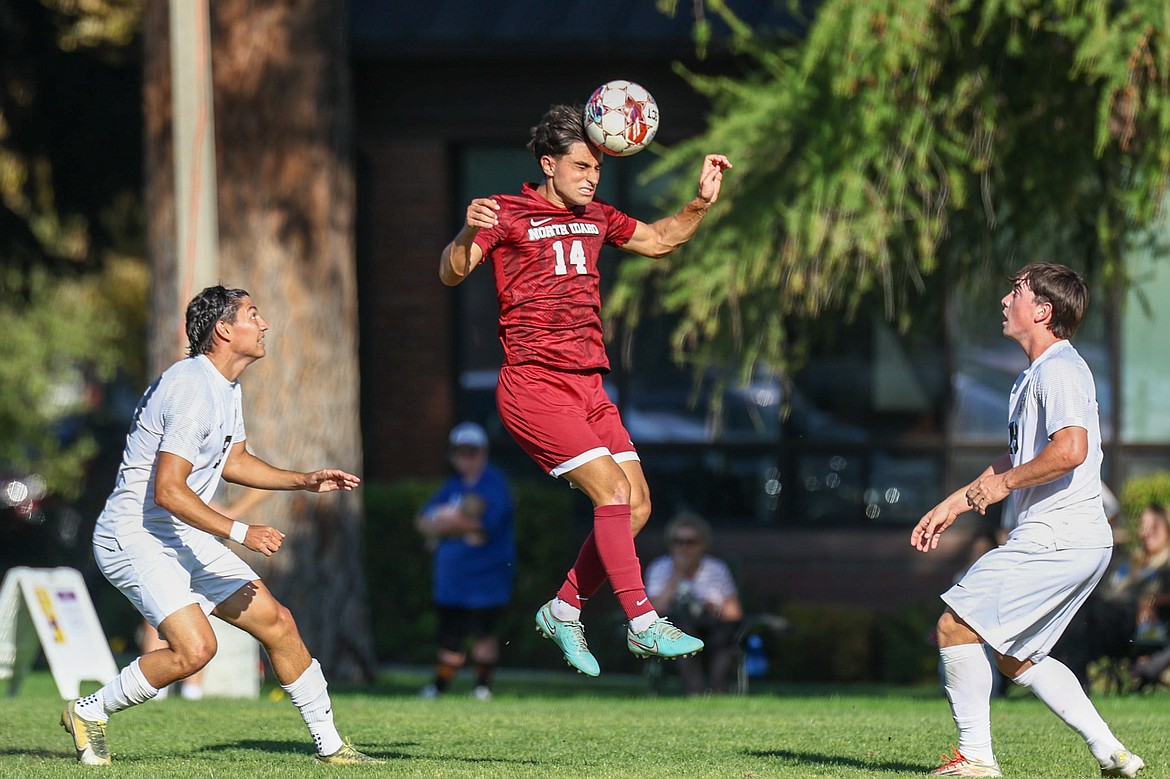 KYLE DISHAW PHOTOGRAPHY North Idaho College freshman midfielder Federico Bellisi plays the ball off his head during the first half of Thursday's Scenic West Athletic Conference match against Salt Lake at Eisenwinter Field.
