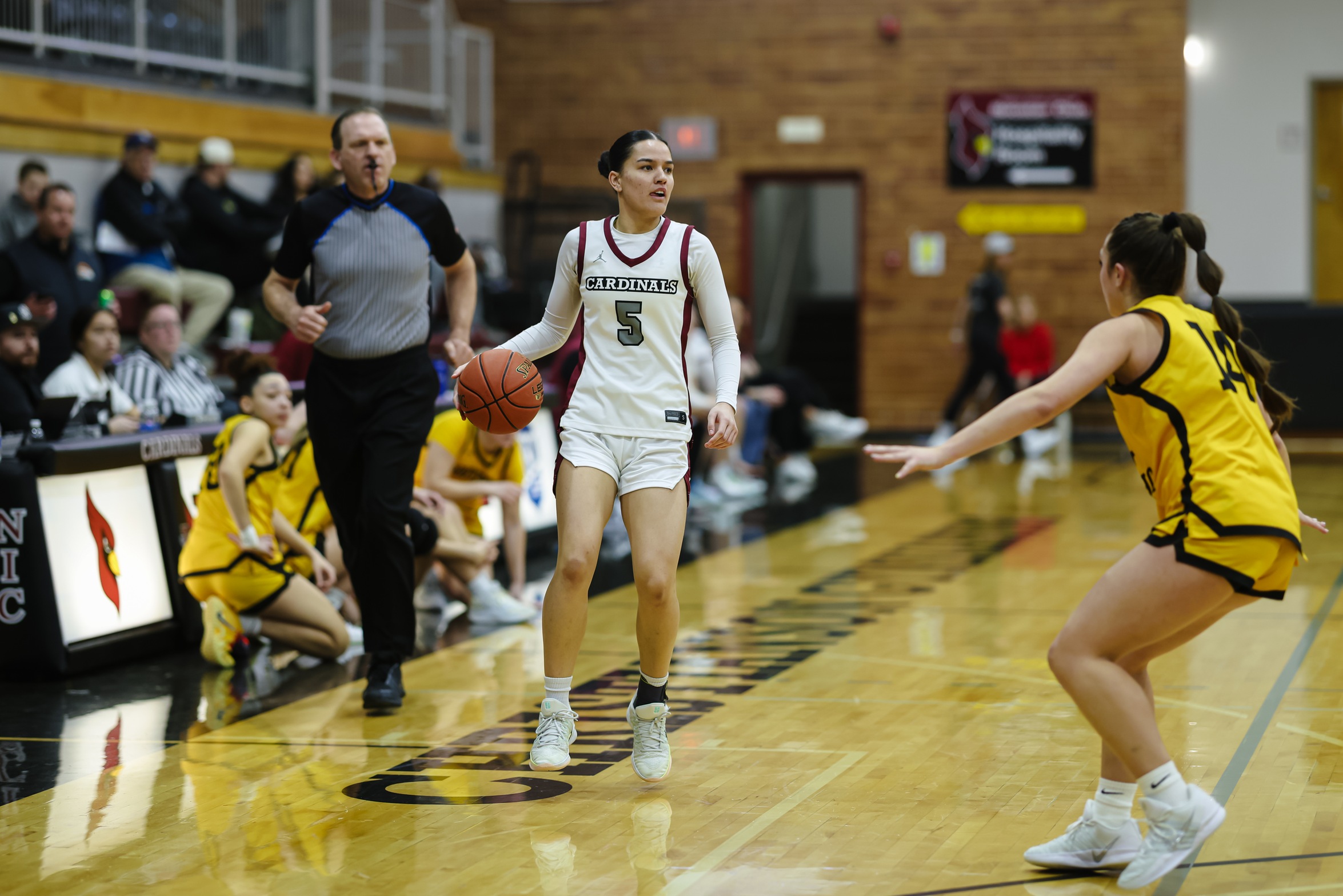 Ripeka Edwards dribbles the ball down the court in Christianson Gymnasium.