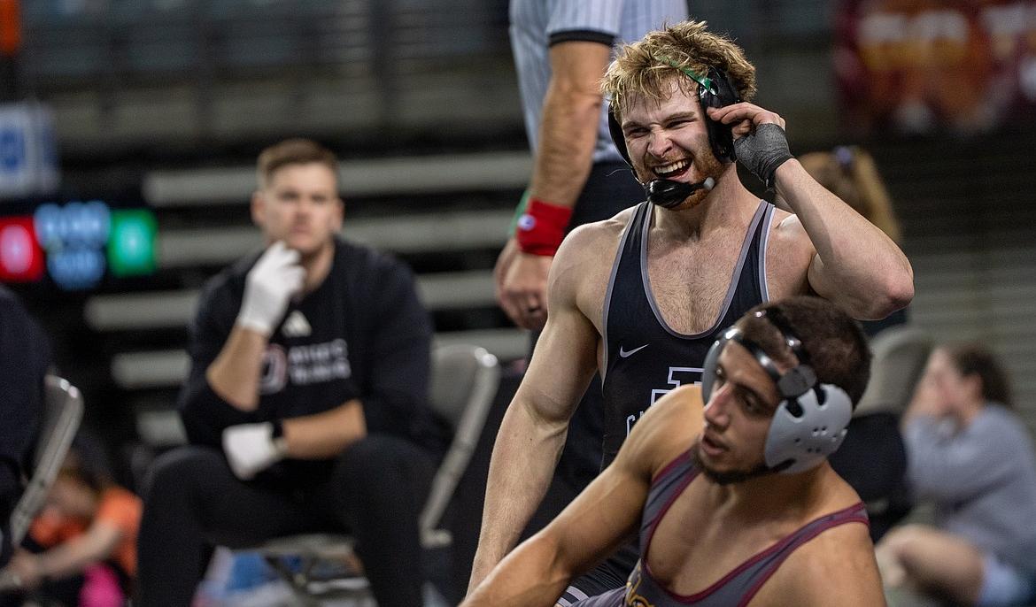 NIC ATHLETICS North Idaho College wrestler Colton Theobald celebrates after winning a third-place match against Mohamed Tarek Abdelhady of Indian Hills in the NJCAA Championships at the Mid-American Center in Council Bluffs, Iowa, on Saturday.