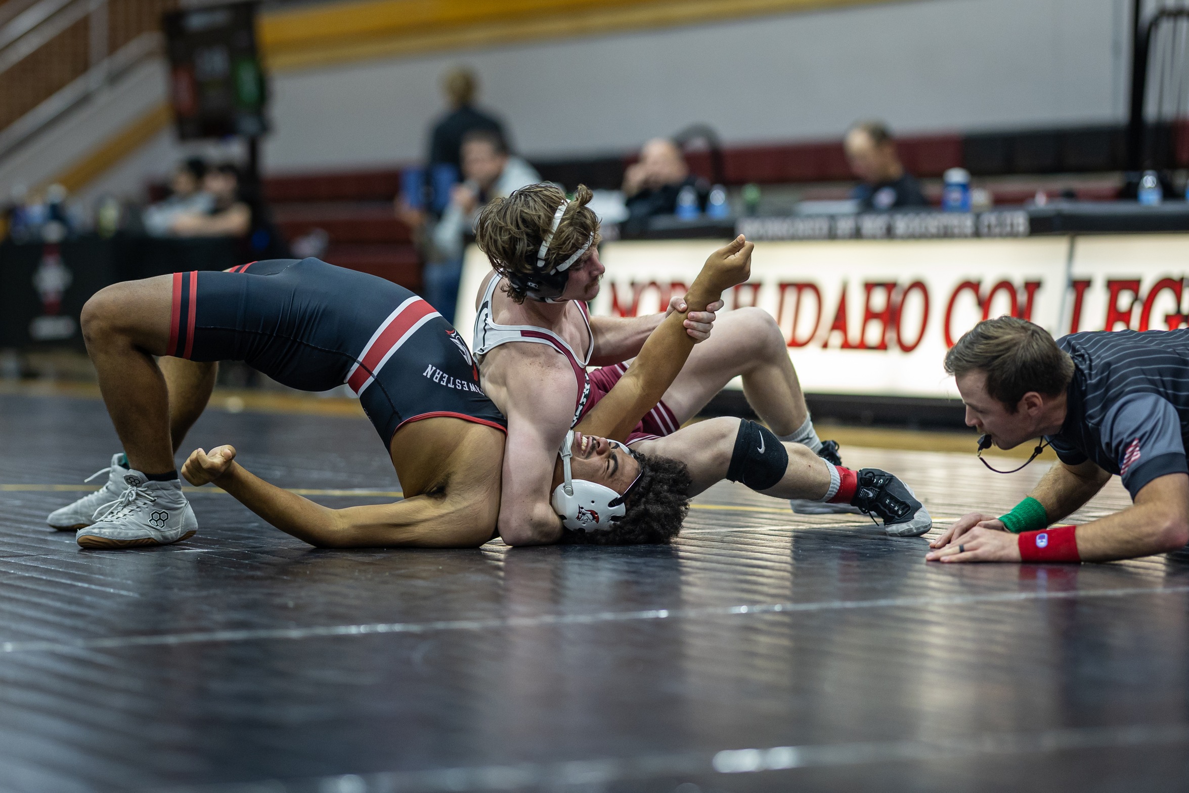 Gabe Lake attempts to pin opponent in Christianson Gymnasium. 