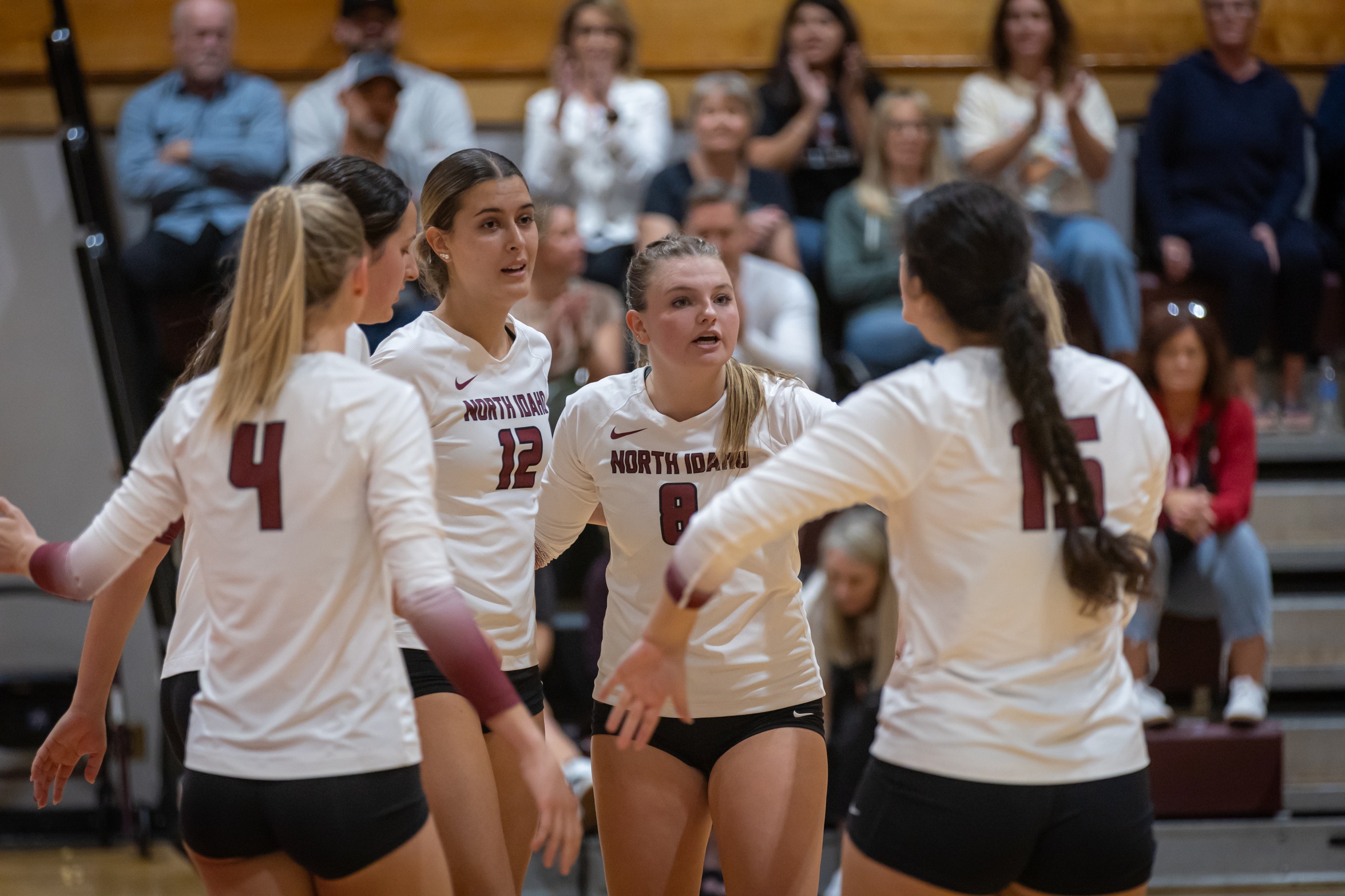 Team huddle for NIC volleyball